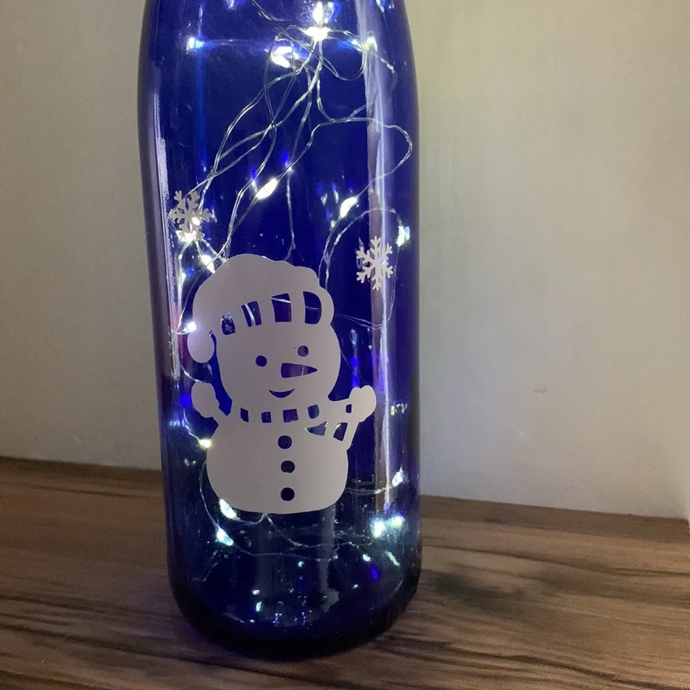 Snowman blue wine bottle lantern
